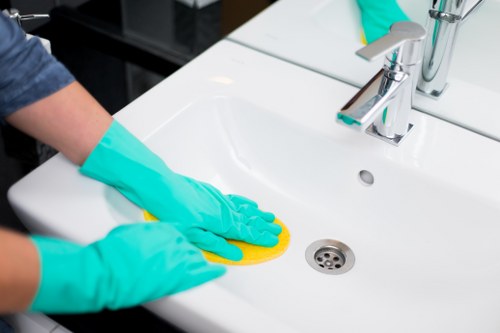 Cleaning a stained shirt fabric with careful stain removal steps
